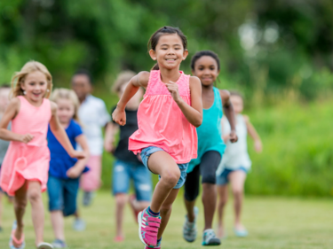 Children running outside.