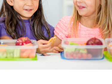 Two students eating lunch together.