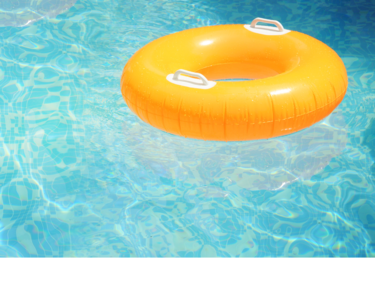 A yellow innertube in a light blue pool.