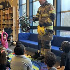 Eddie Plenert speaking with students.