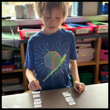 A student sorting words from his word list.